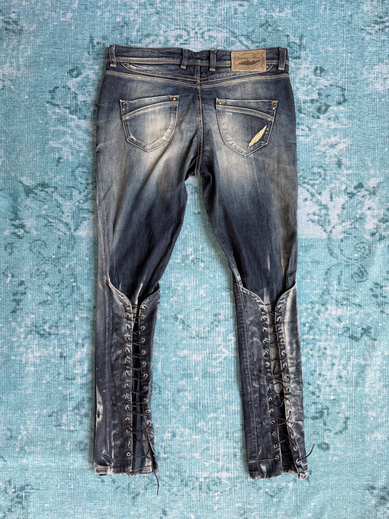 laced-back jeans