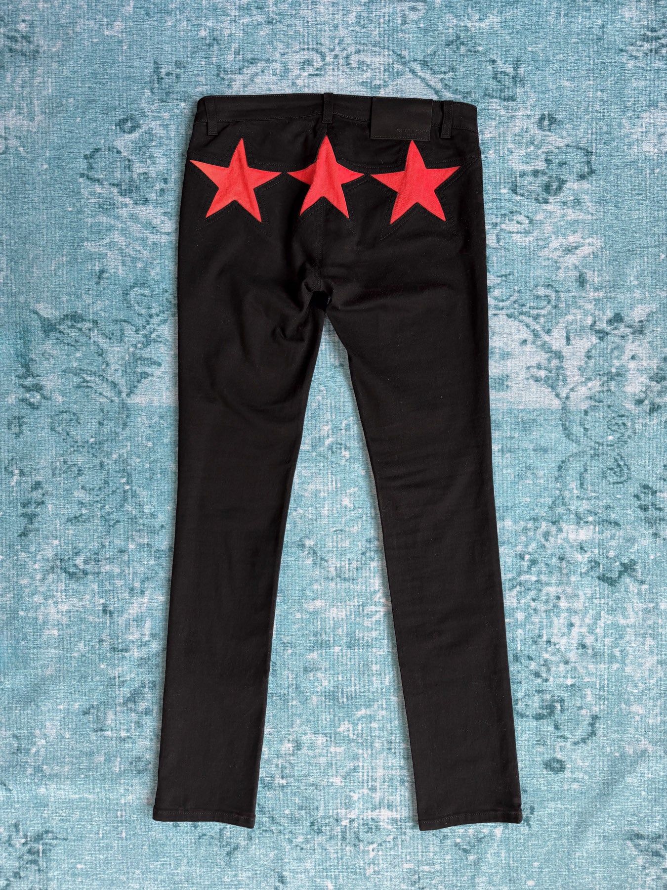 GIVENCHY red stars patch skinny jeans