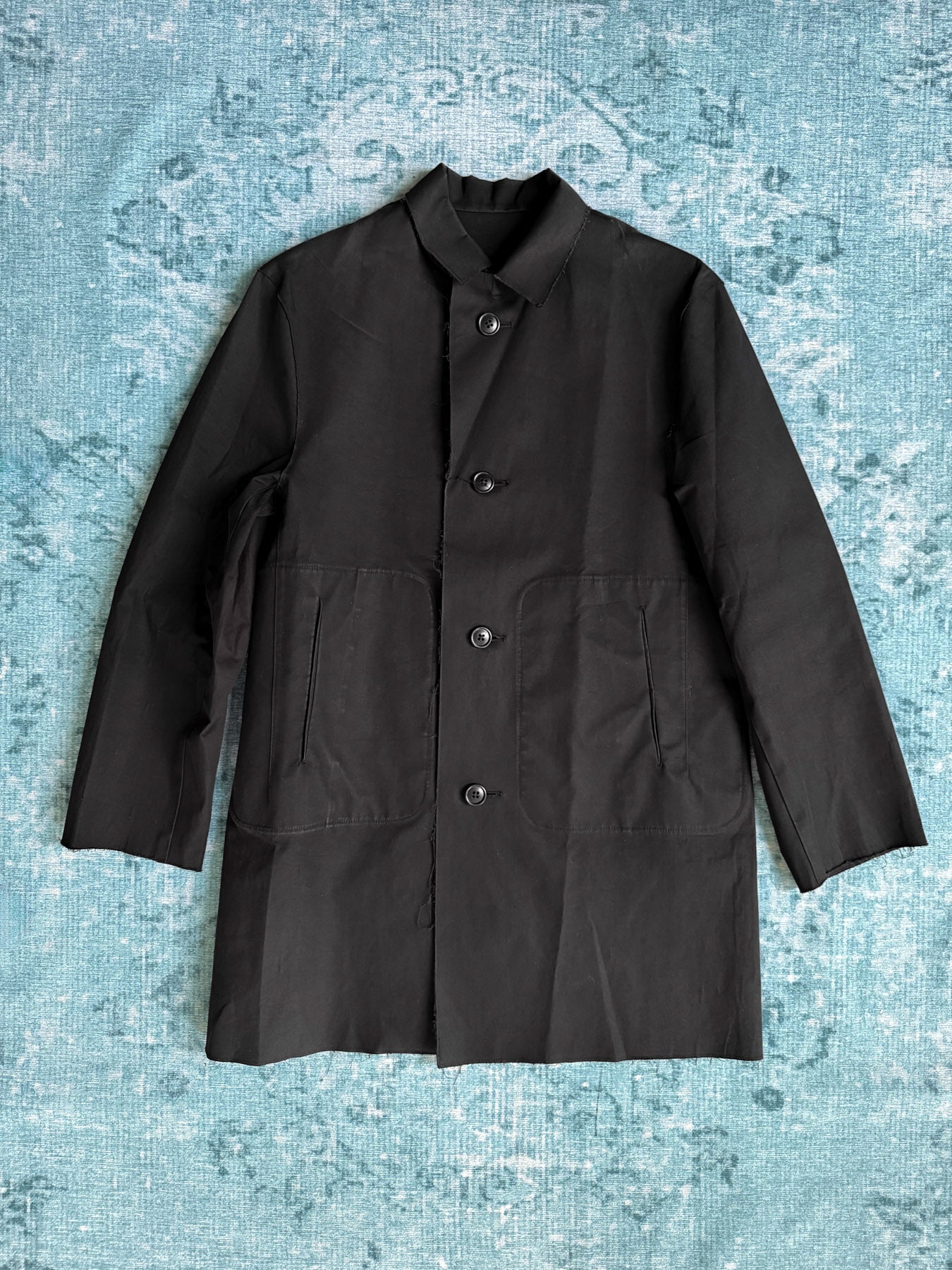 black raw-edge work jacket