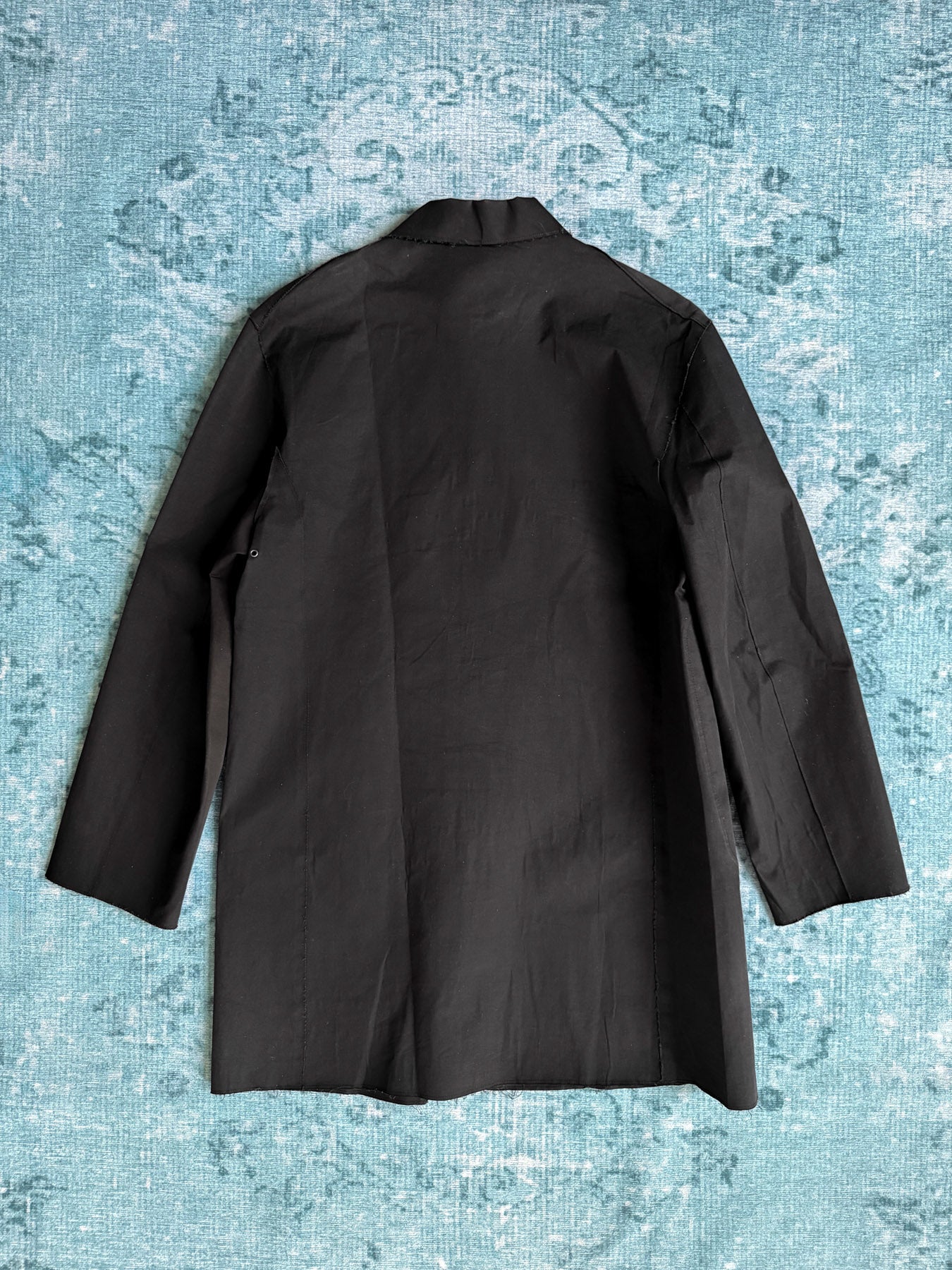 black raw-edge work jacket