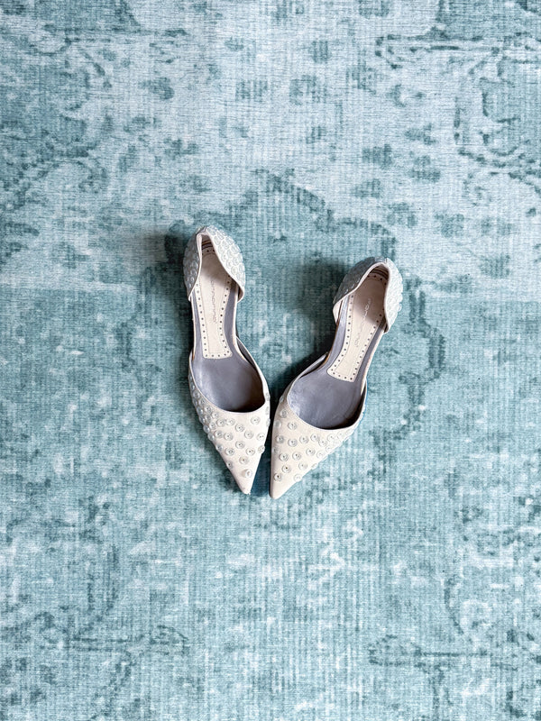 button-embossed kitten heels