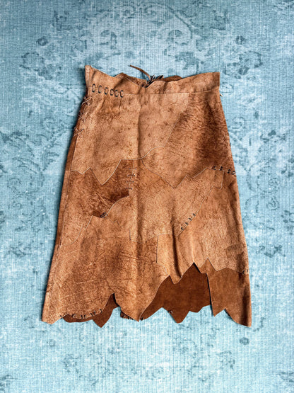 patchwork suede pierced raw-edge skirt