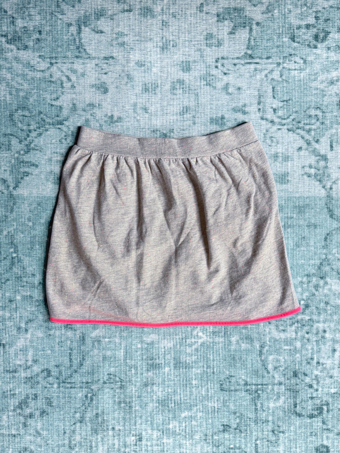 grey jersey skirt with neon pink trim
