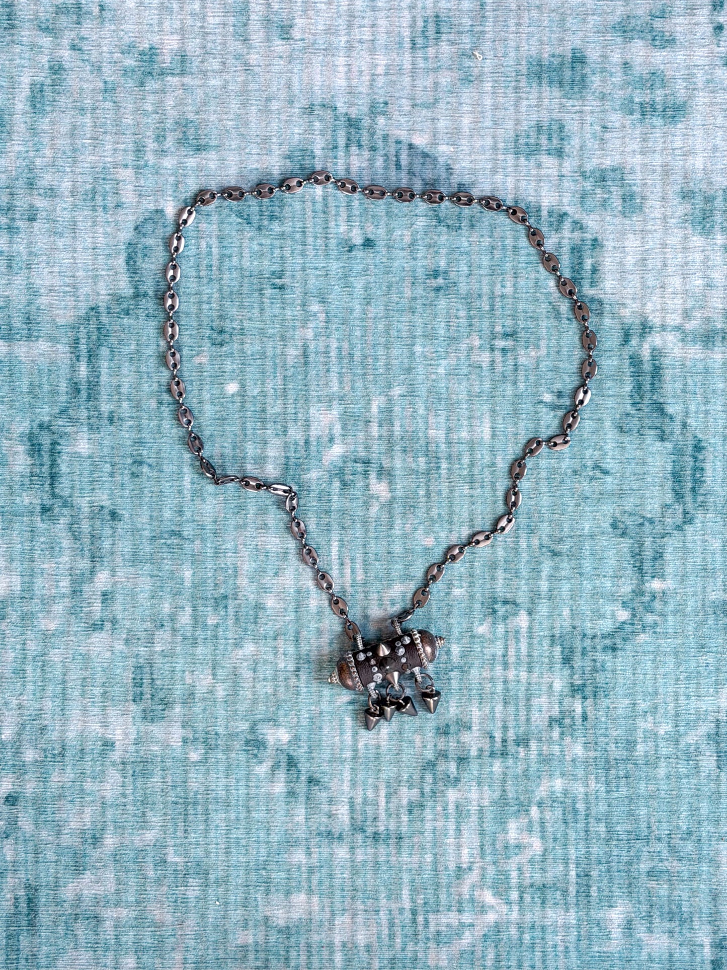 gunmetal chain necklace with spiked pendant