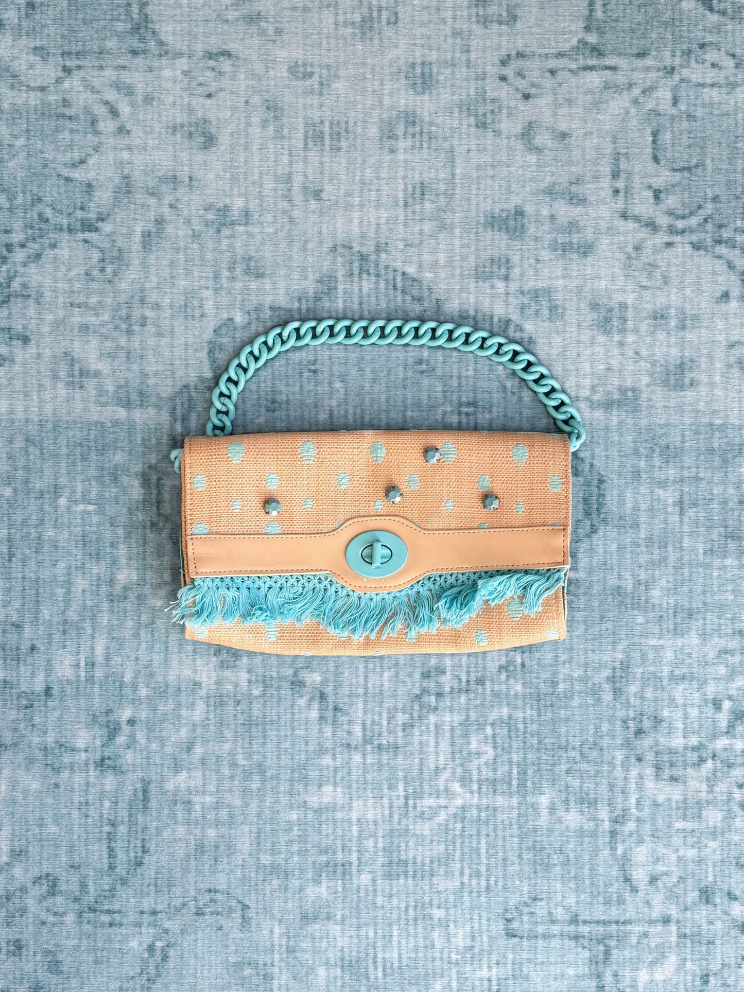 polka-dot fringe chain-handle clutch