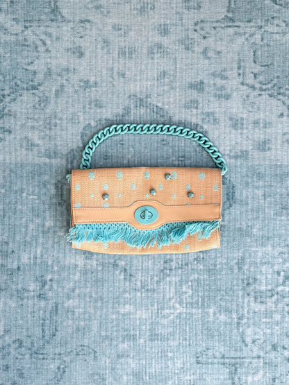 polka-dot fringe chain-handle clutch