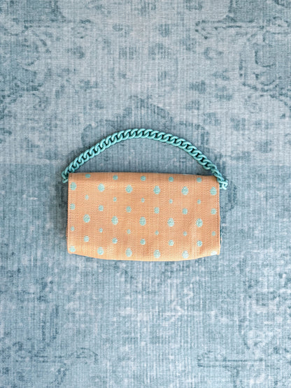 polka-dot fringe chain-handle clutch
